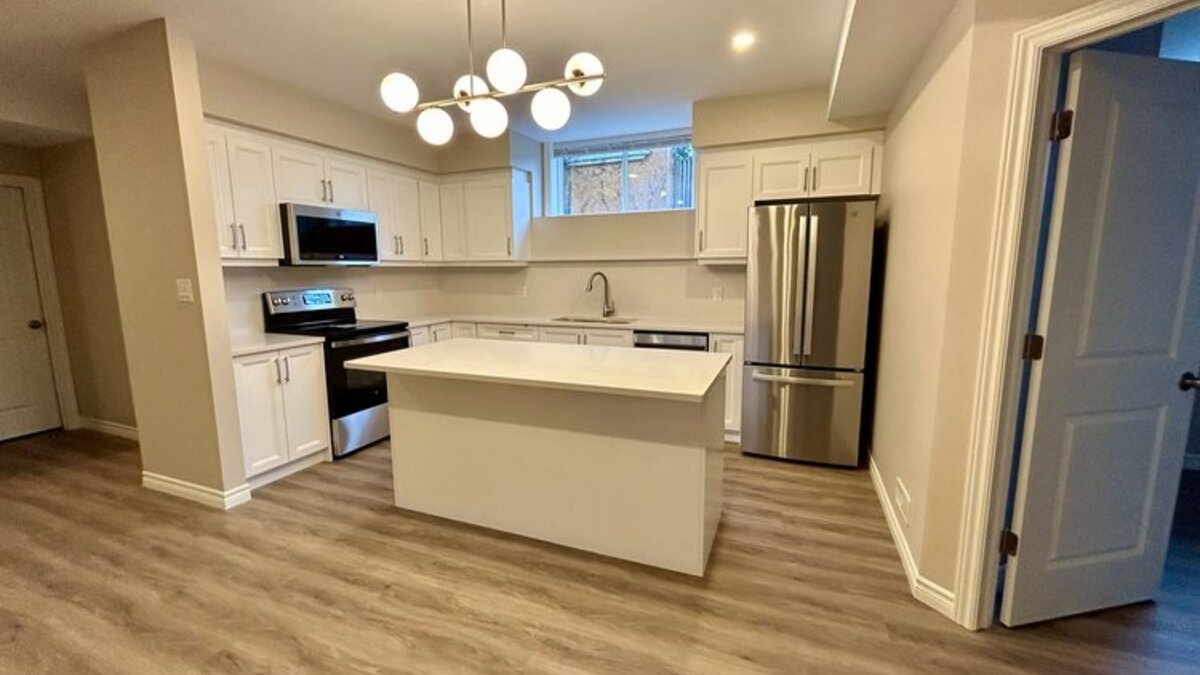 Lower level kitchen - Quartz cabinets, stainless appliances thumbnail